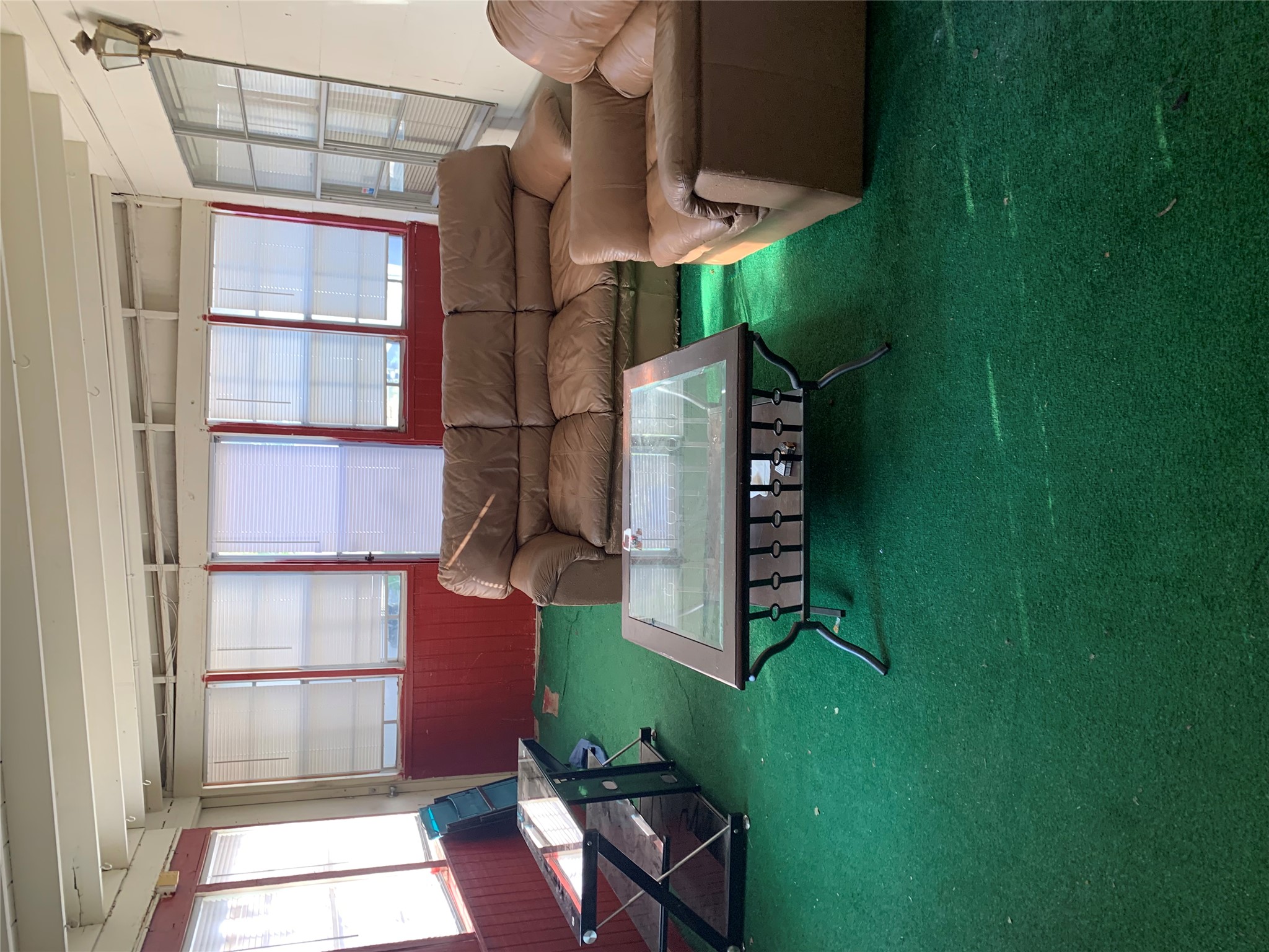 709 West 11th Street Elgin, TX 78621 - Photo 8 of 12 a living room with furniture and a large window