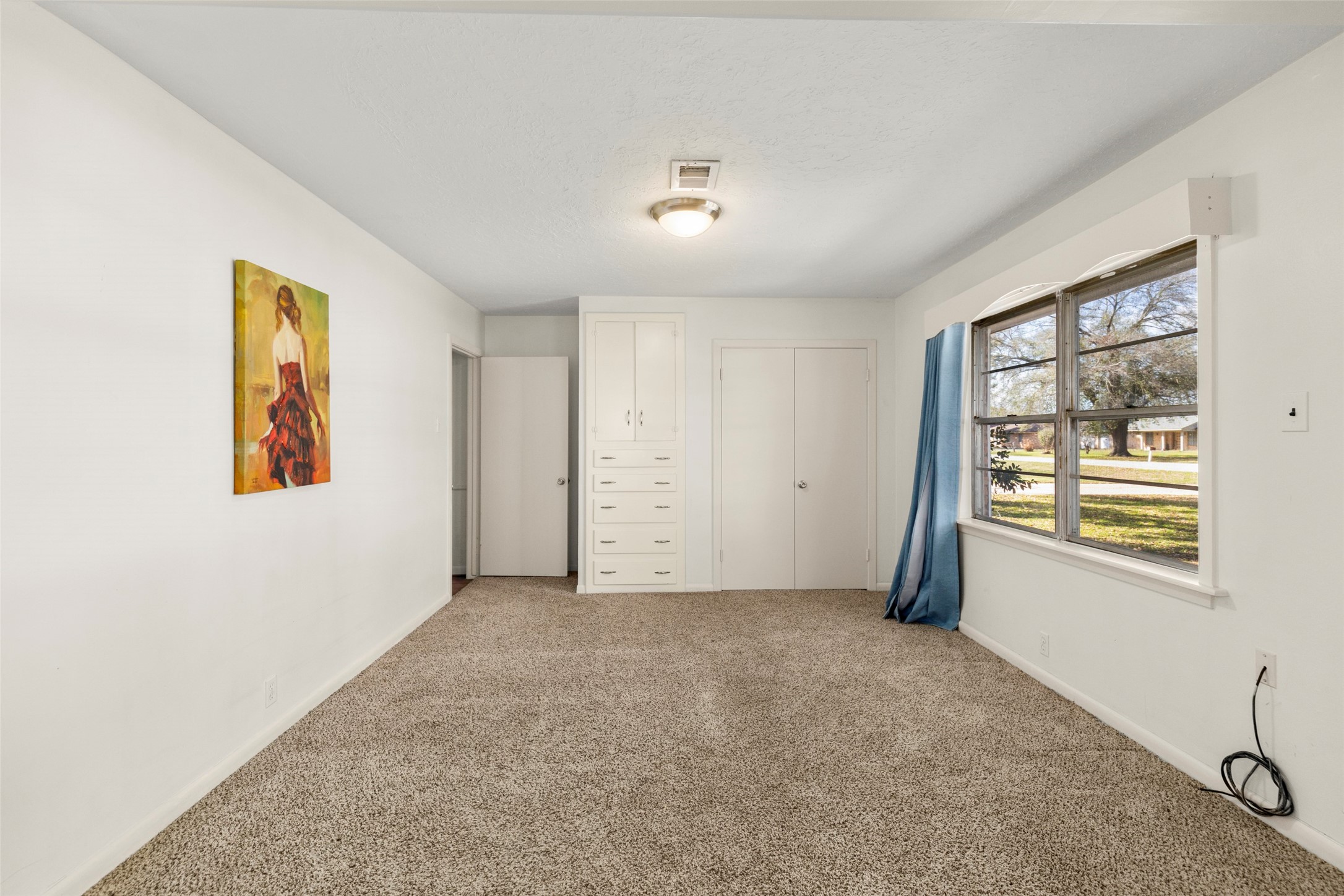 9001 Friendship Road Houston, TX 77080 - Photo 11 of 22 a view of an empty room with a window