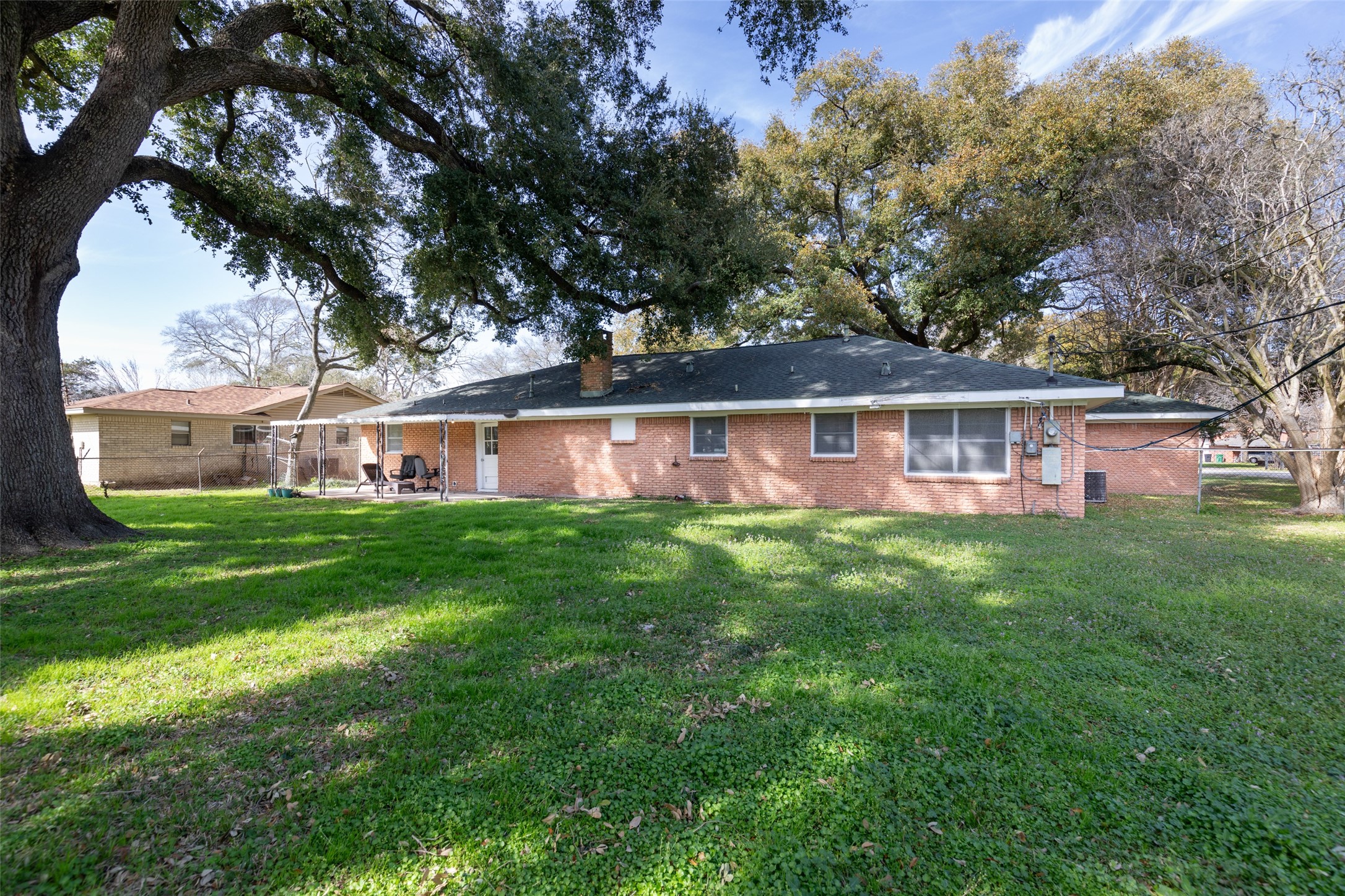 9001 Friendship Road Houston, TX 77080 - Photo 19 of 22 a view of a house with a yard porch and sitting area
