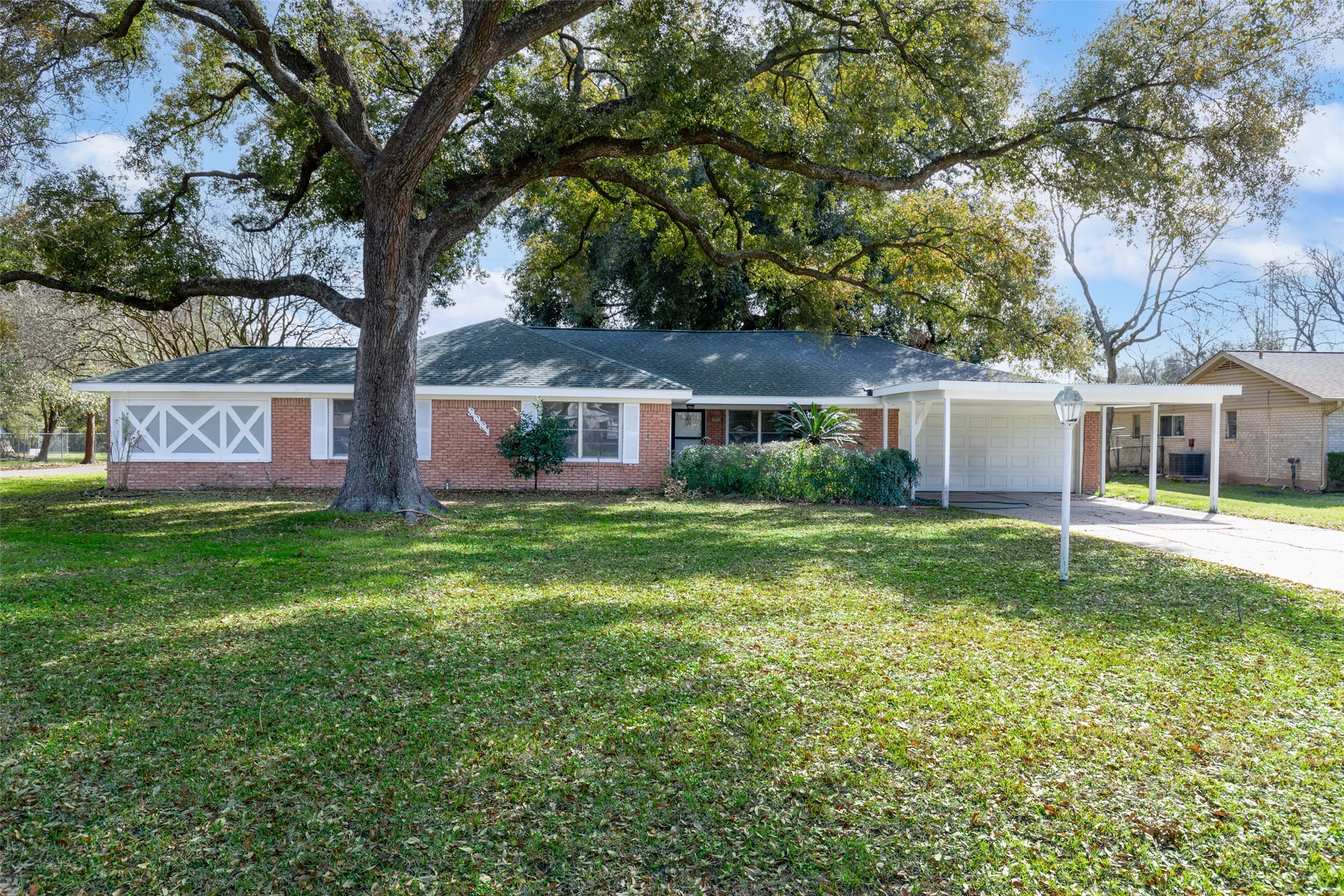 9001 Friendship Road Houston, TX 77080 - Photo 2 of 22 front view of a house with a yard