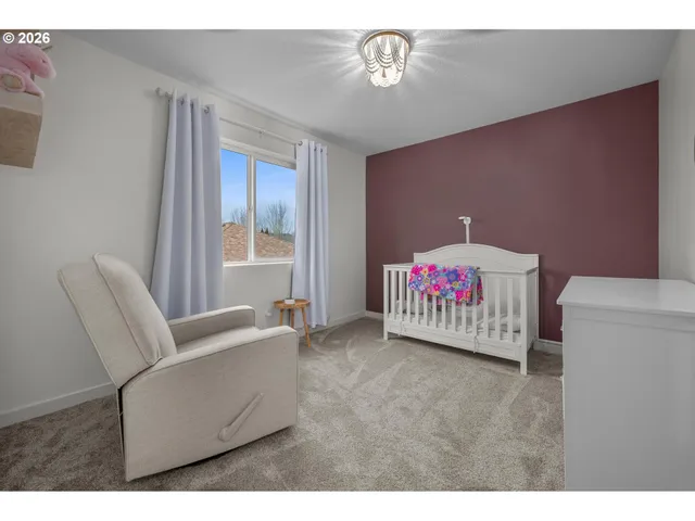 a bathroom with a sink double vanity granite and a mirror