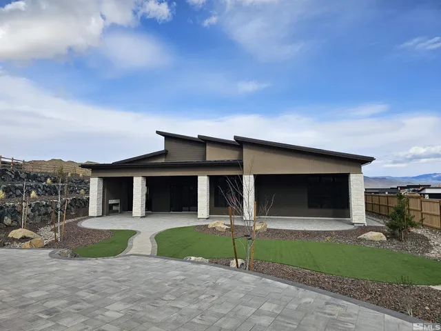 a house view with a garden space