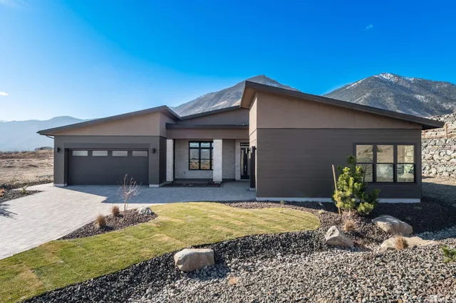 a view of a house with a swimming pool
