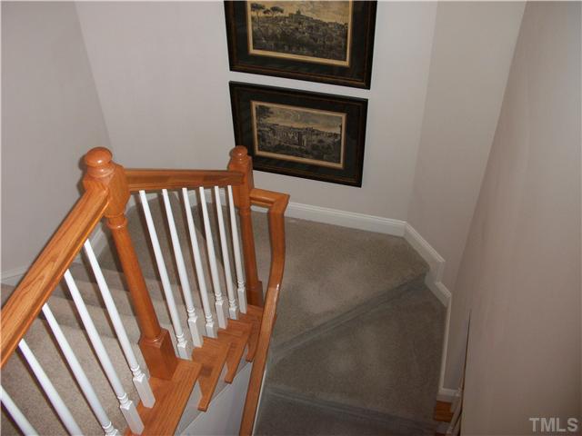 7318 Fontana Ridge Lane Raleigh, NC 27613 - Photo 15 of 23 The landing coming upstairs...
