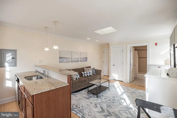 a living room with furniture and a table