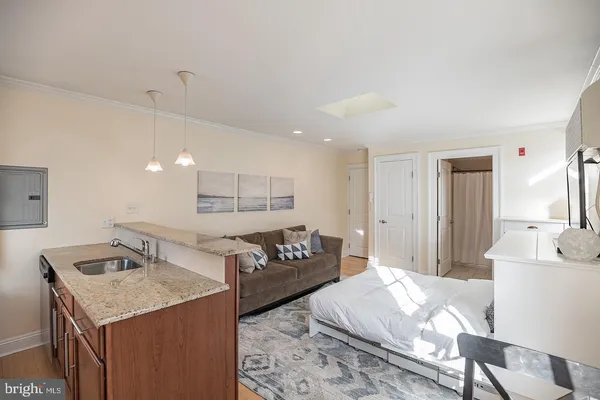 a living room with furniture and a table