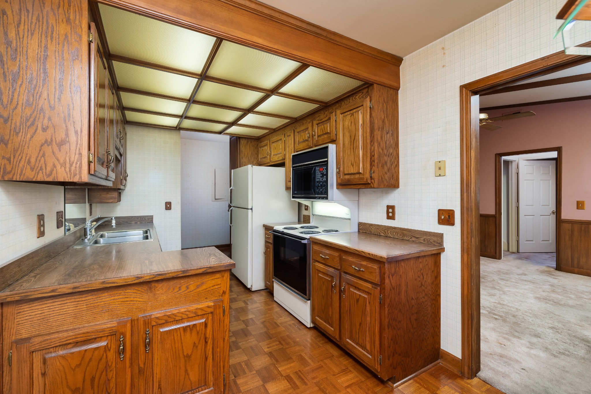 522 General George Patton Road Nashville, TN 37221 - Photo 11 of 27 a kitchen with stainless steel appliances granite countertop a sink stove and refrigerator