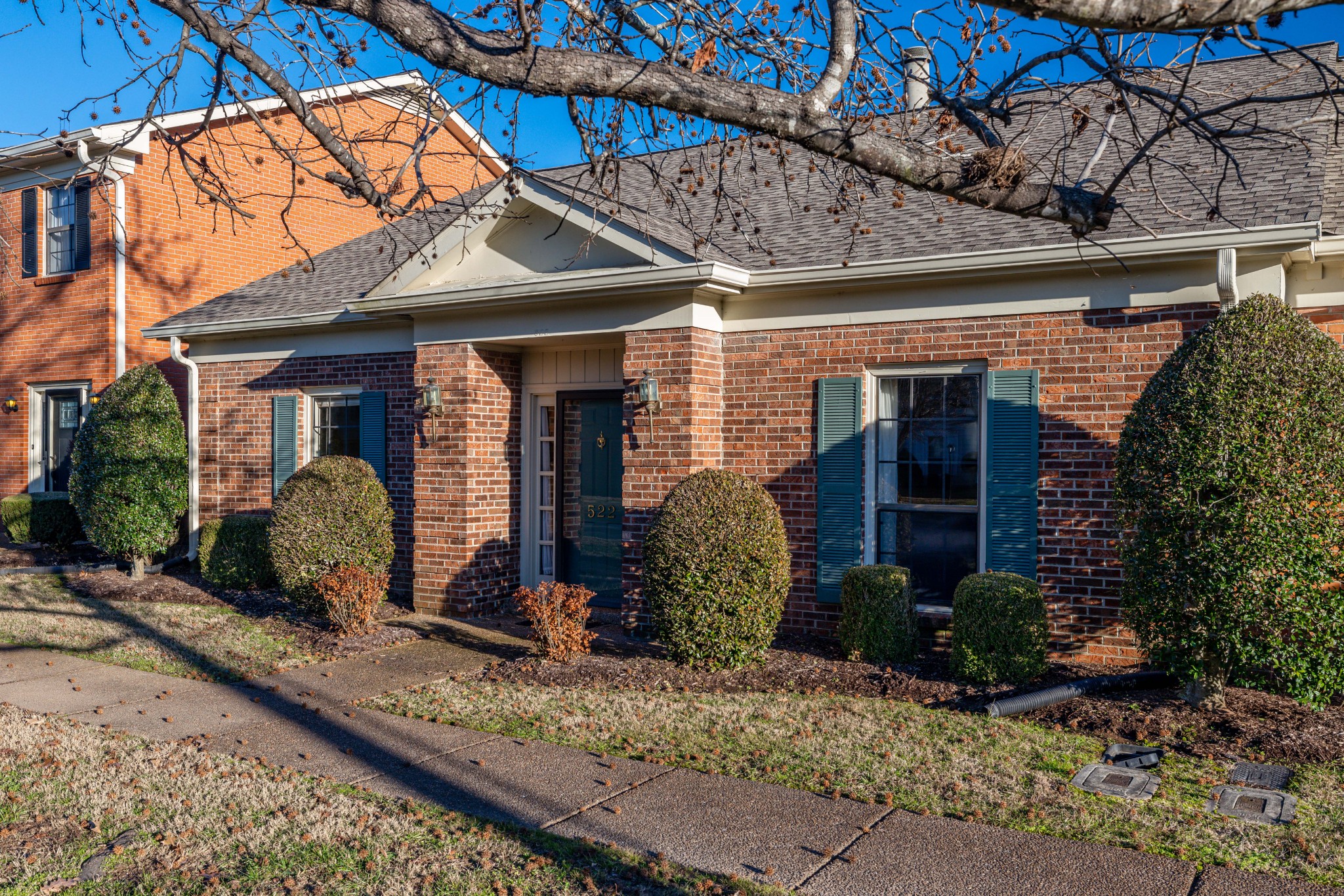 522 General George Patton Road Nashville, TN 37221 - Photo 2 of 27 a front view of a house with garden