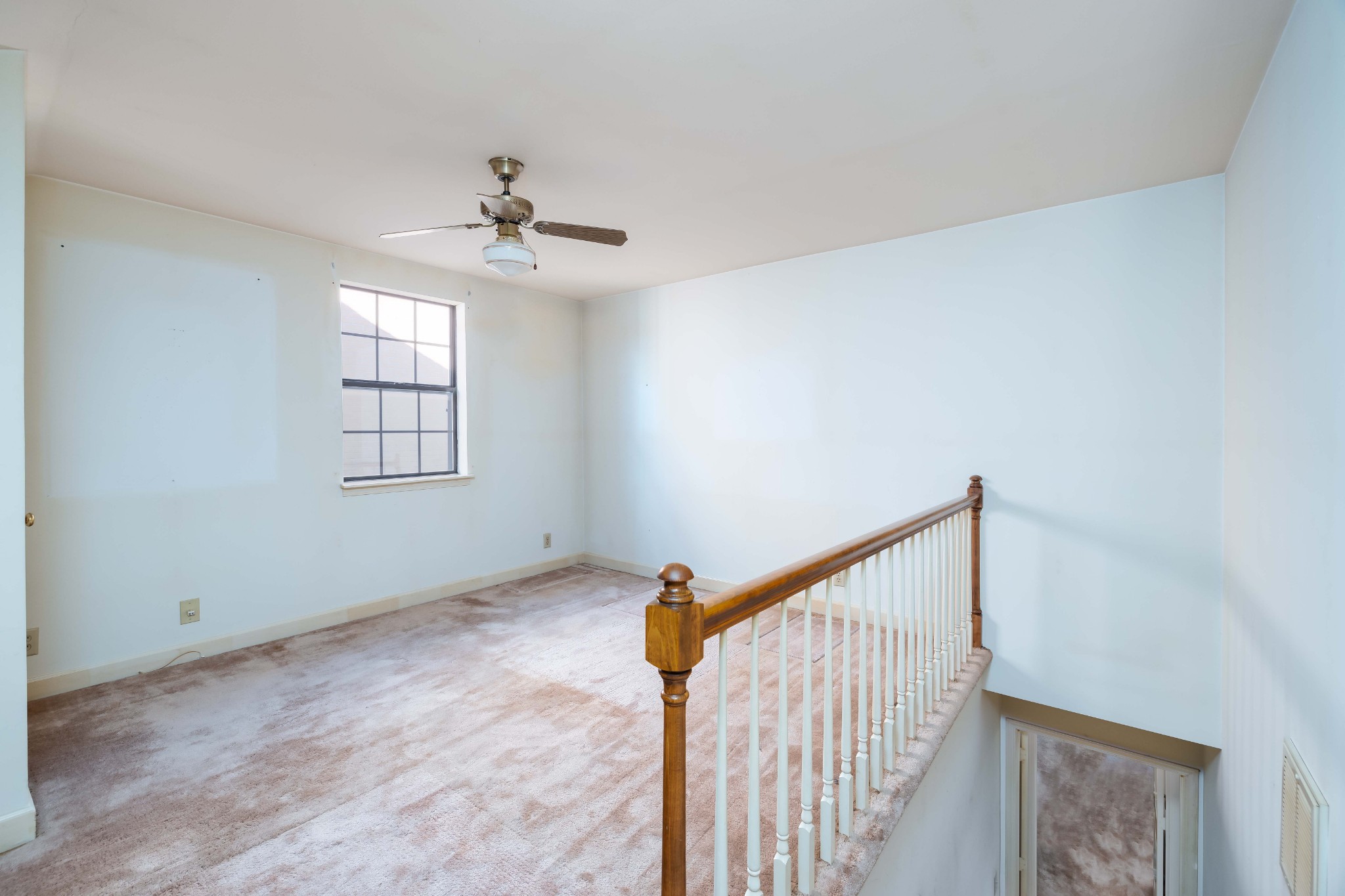 522 General George Patton Road Nashville, TN 37221 - Photo 23 of 27 a view of a hallway with windows and chandelier fan
