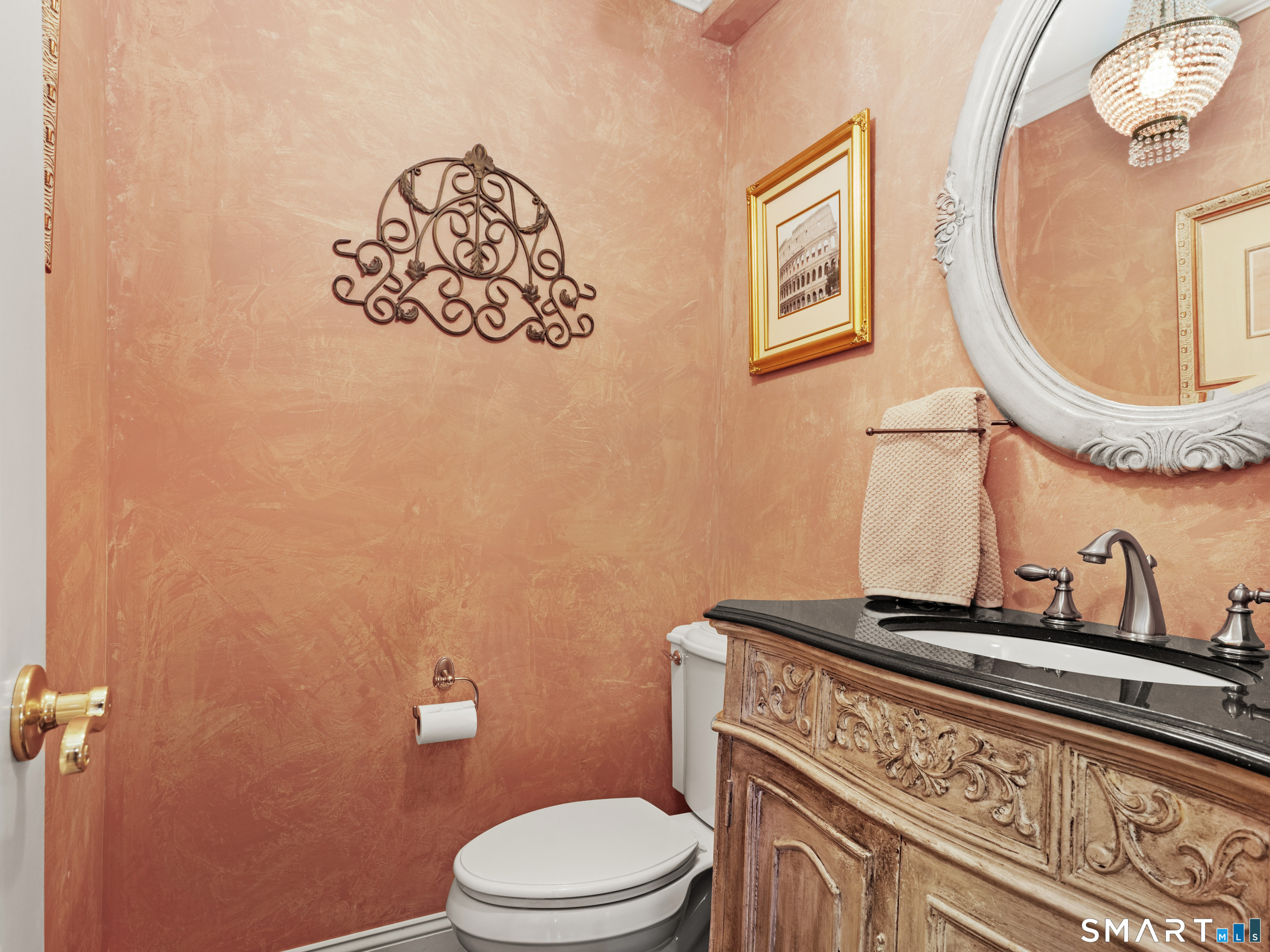 82 Ramapoo Road Ridgefield, CT 06877 - Photo 21 of 40 a bathroom with a toilet a sink and mirror