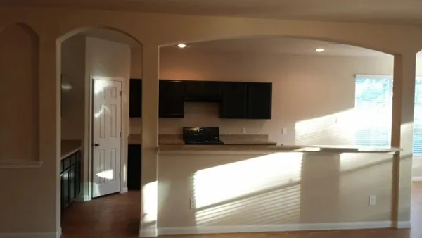 a view of a living room and a flat screen tv