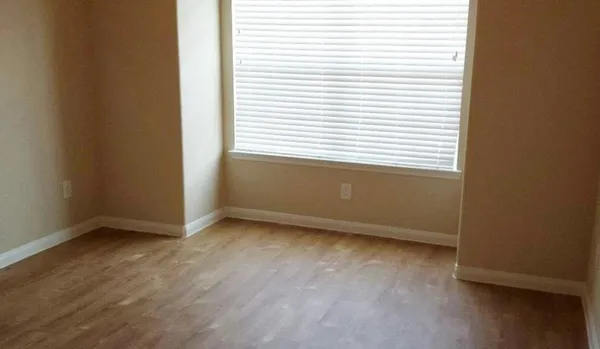 an empty room with a window