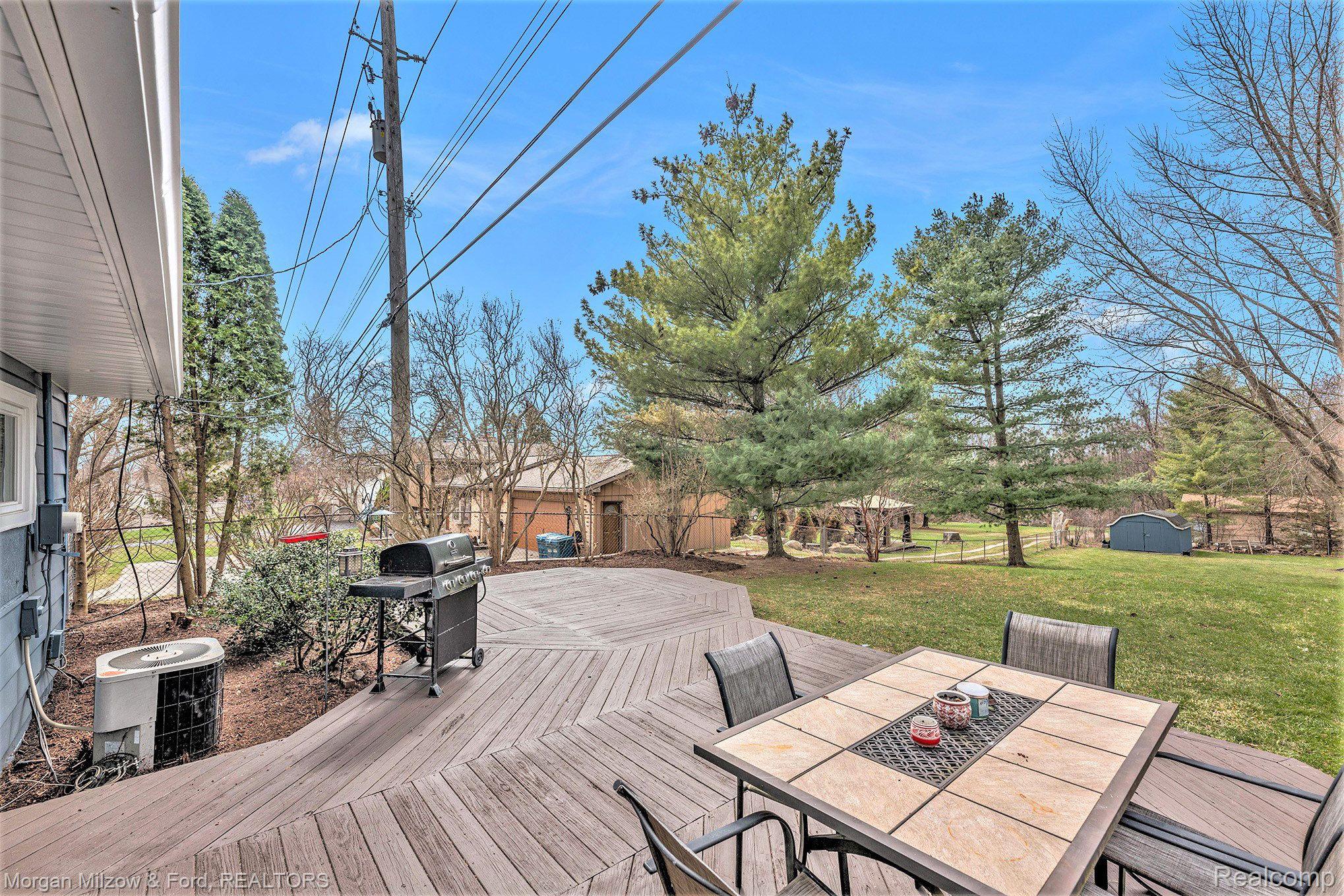 6901 Clintonville Road Clarkston, MI 48348 - Photo 23 of 31 Freshly stained deck
