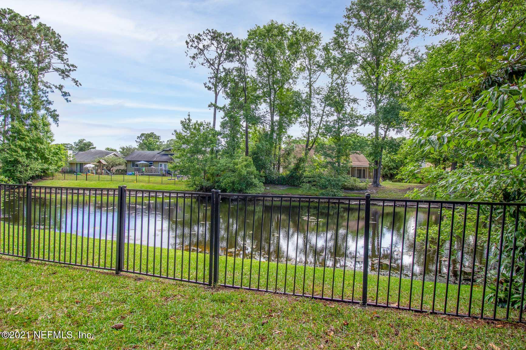 2159 Deer Run Trail Jacksonville, FL 32246 - Photo 3 of 15 a view of a lake from a yard