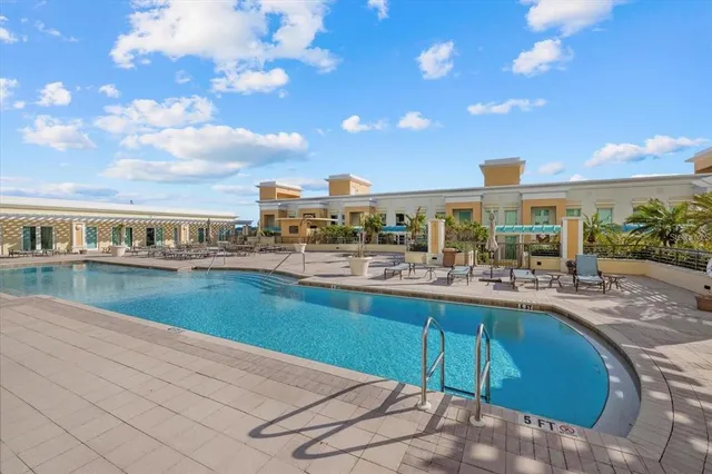 an aerial view of a house a garden and patio