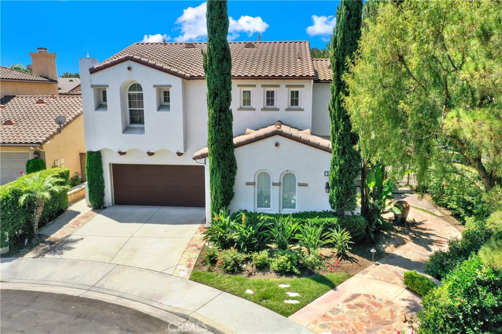 2 Grapevine Irvine, CA 92602 - Photo 1 of 1 a front view of a house with a garden
