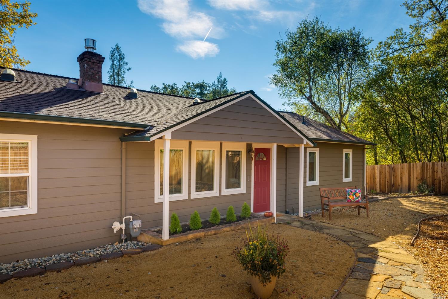 4190 Sonoma Mountain Road Santa Rosa, CA 95404 - Photo 1 of 1 a front view of a house with a yard
