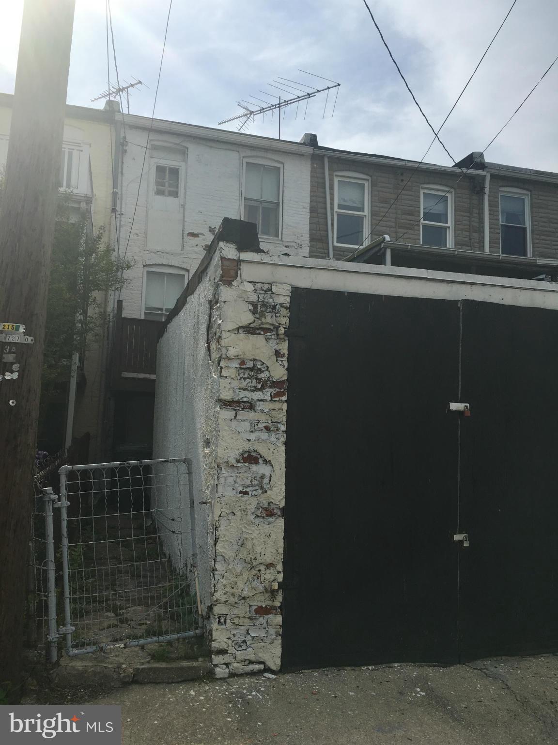 3615 Keswick Road Baltimore, MD 21211 - Photo 16 of 20 a view of a house with a door