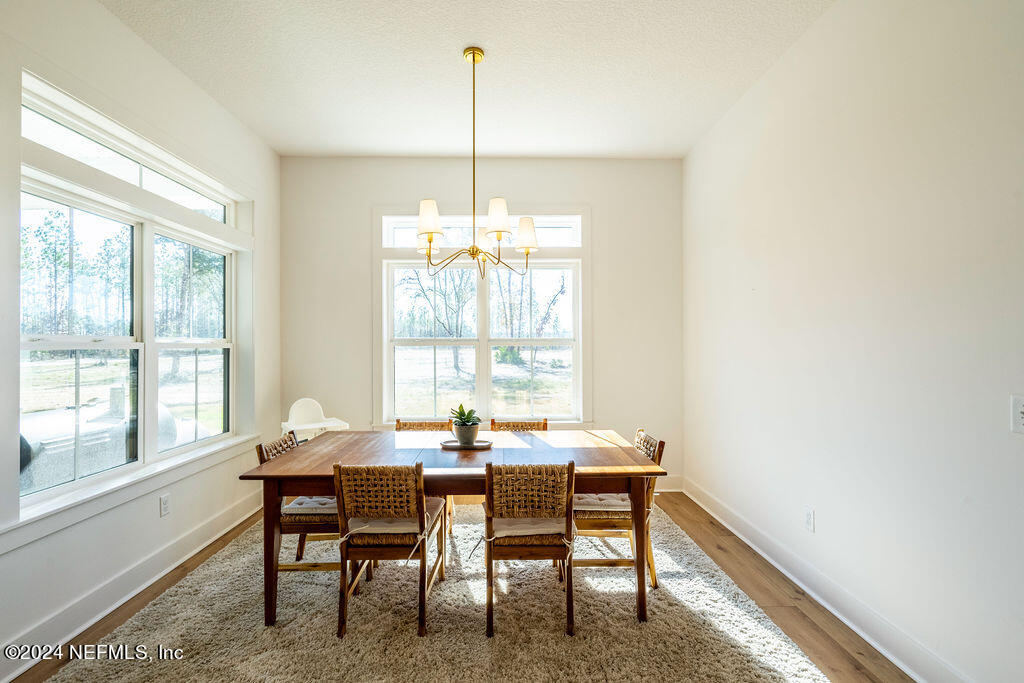 35364 Quail Road Callahan, FL 32011 - Photo 16 of 40 a dining room with furniture and window