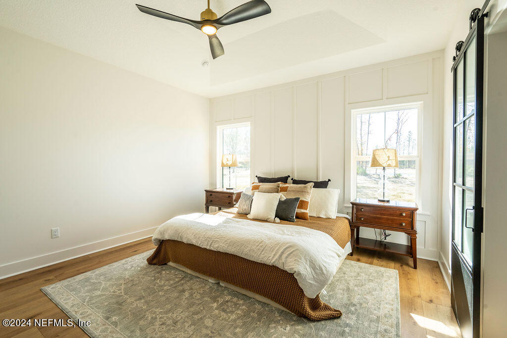 35364 Quail Road Callahan, FL 32011 - Photo 19 of 40 a bedroom with a bed and a window