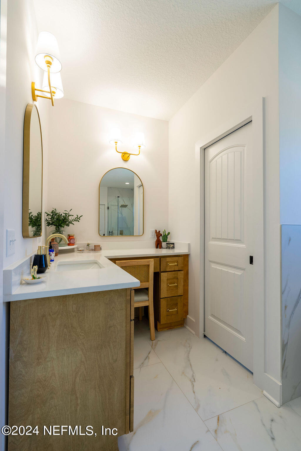 35364 Quail Road Callahan, FL 32011 - Photo 21 of 40 a bathroom with a sink and a mirror