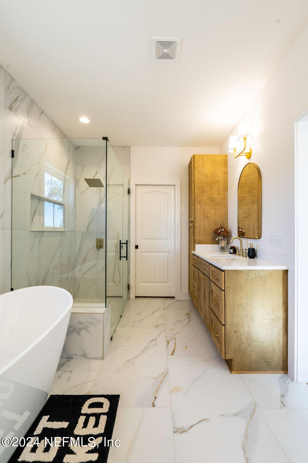 35364 Quail Road Callahan, FL 32011 - Photo 22 of 40 a bathroom with a sink a toilet and shower