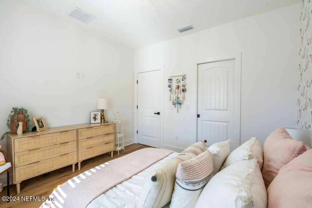 35364 Quail Road Callahan, FL 32011 - Photo 30 of 40 a bedroom with a bed and a closet