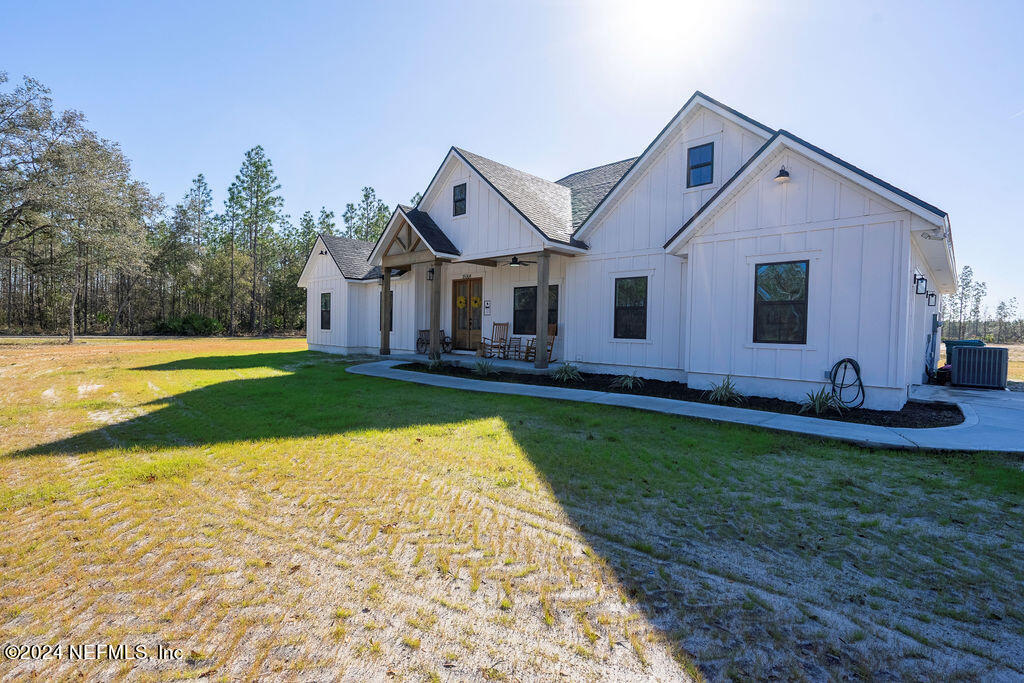 35364 Quail Road Callahan, FL 32011 - Photo 3 of 40 a view of a house with a backyard