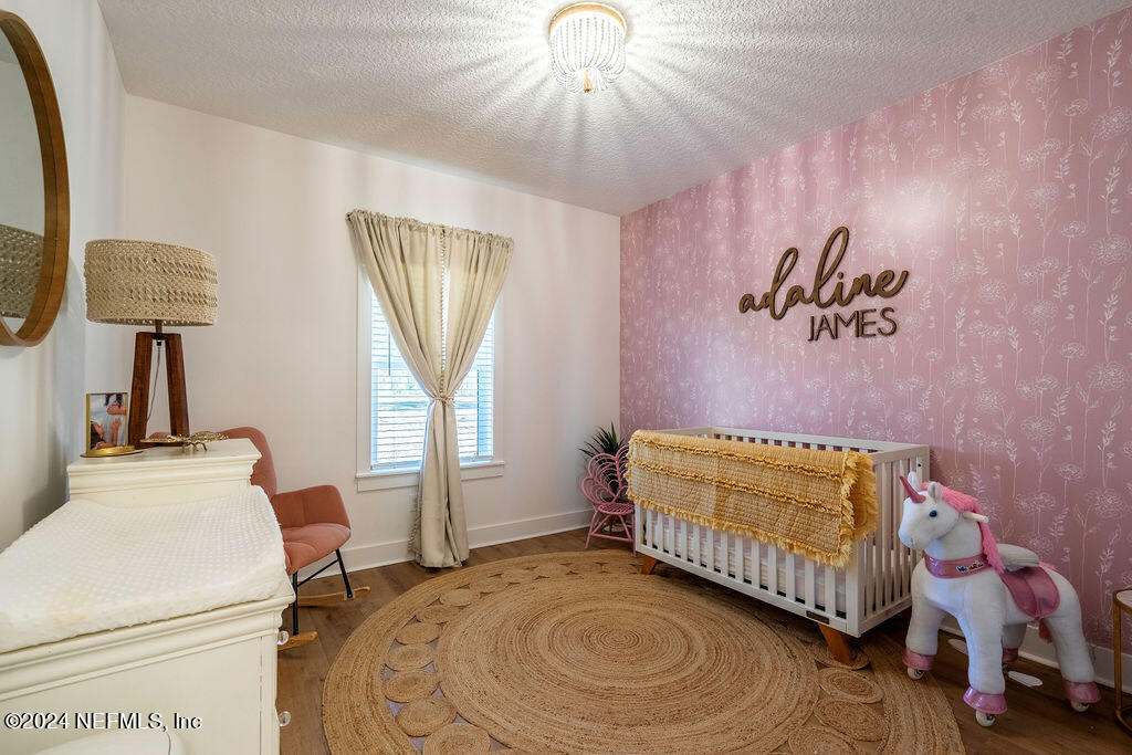 35364 Quail Road Callahan, FL 32011 - Photo 31 of 40 a bedroom with a bed and a window
