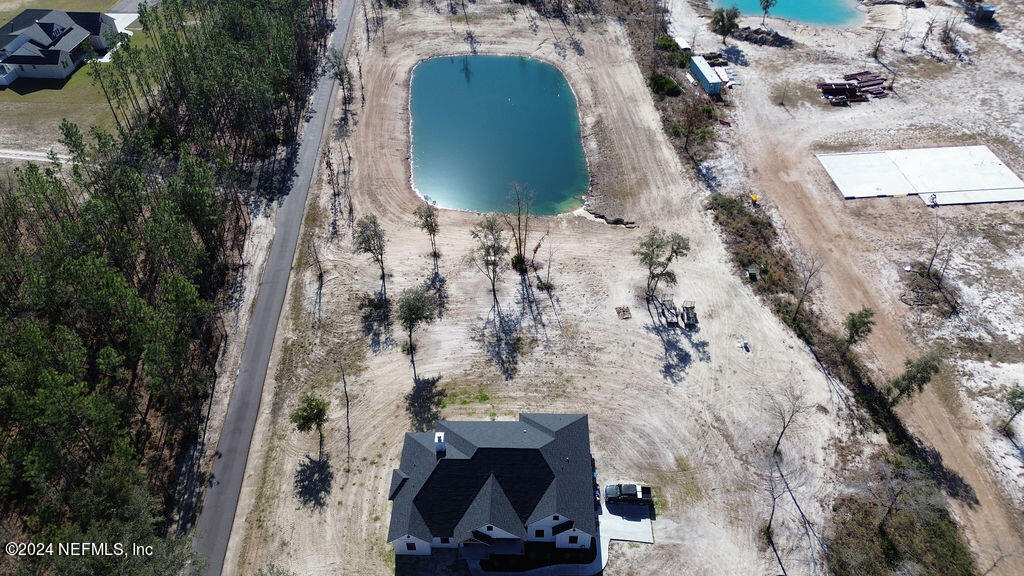 35364 Quail Road Callahan, FL 32011 - Photo 39 of 40 an aerial view of a house with a swimming pool