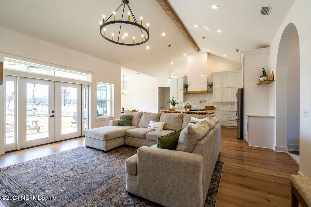 35364 Quail Road Callahan, FL 32011 - Photo 10 of 40 a living room with furniture windows and kitchen view