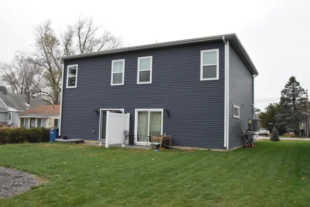 a brick house with a yard