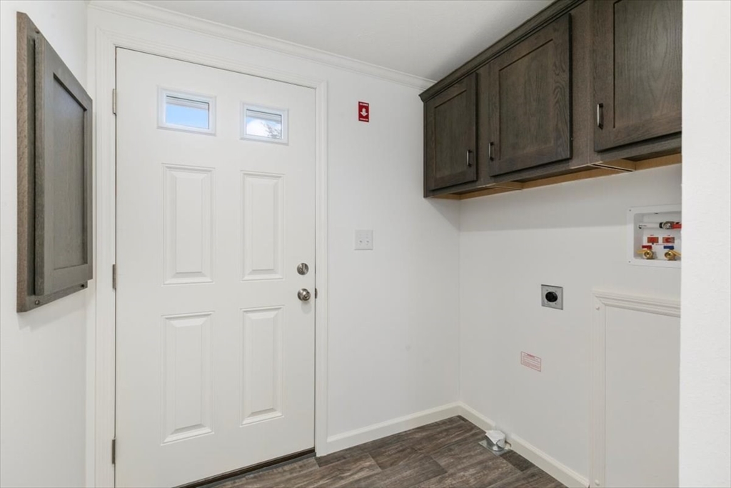 3 B Street Merrimac, MA 01860 - Photo 16 of 26 a view of a storage and utility room with wooden floor