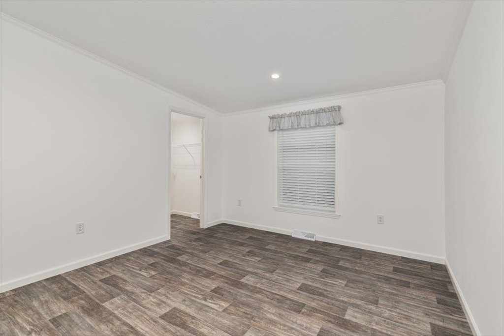 3 B Street Merrimac, MA 01860 - Photo 20 of 26 a view of empty room with wooden floor and fan