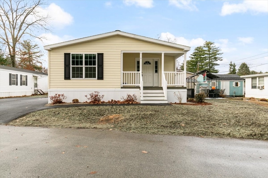 3 B Street Merrimac, MA 01860 - Photo 3 of 26 a front view of a house with a yard