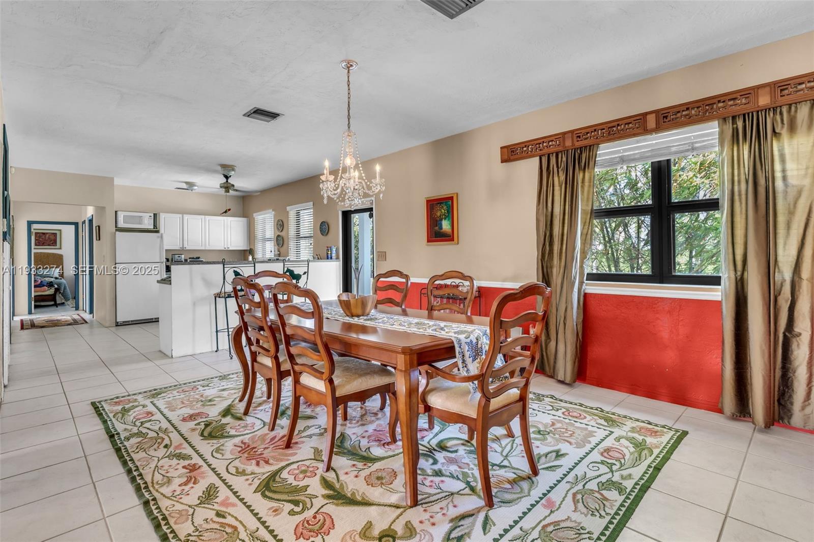 18900 Southwest 224th Street Miami, FL 33170 - Photo 12 of 23 a dining room with furniture and window