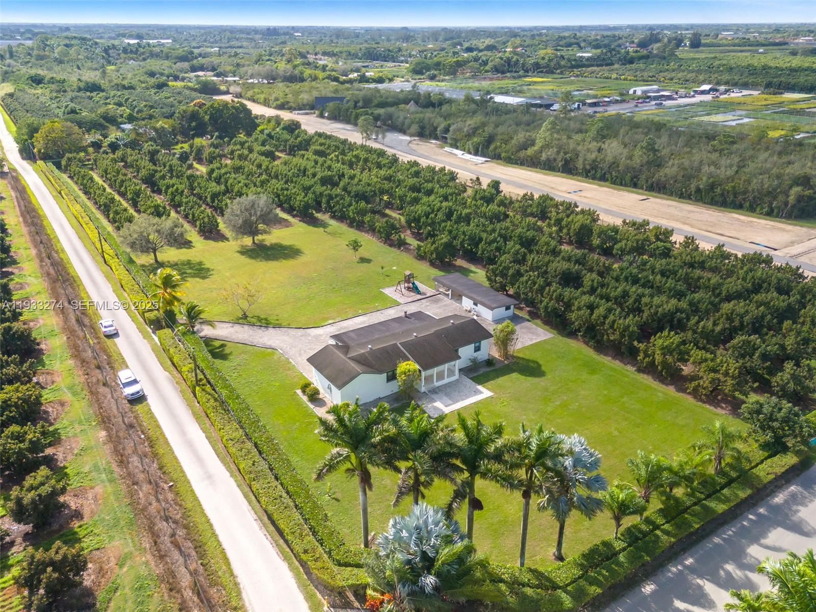 18900 Southwest 224th Street Miami, FL 33170 - Photo 22 of 23 an aerial view of lake