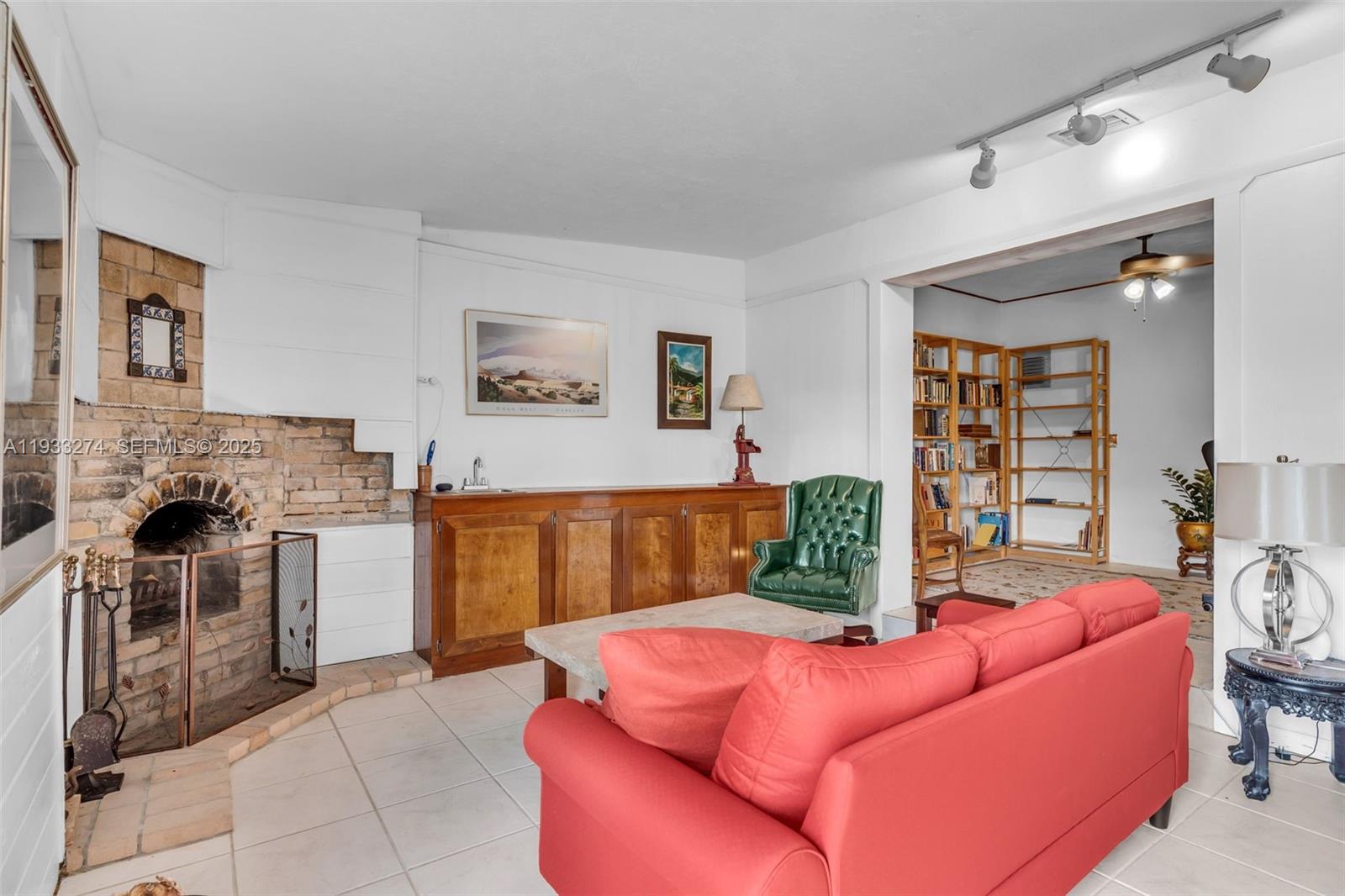 18900 Southwest 224th Street Miami, FL 33170 - Photo 9 of 23 a bedroom with a bed and a couch