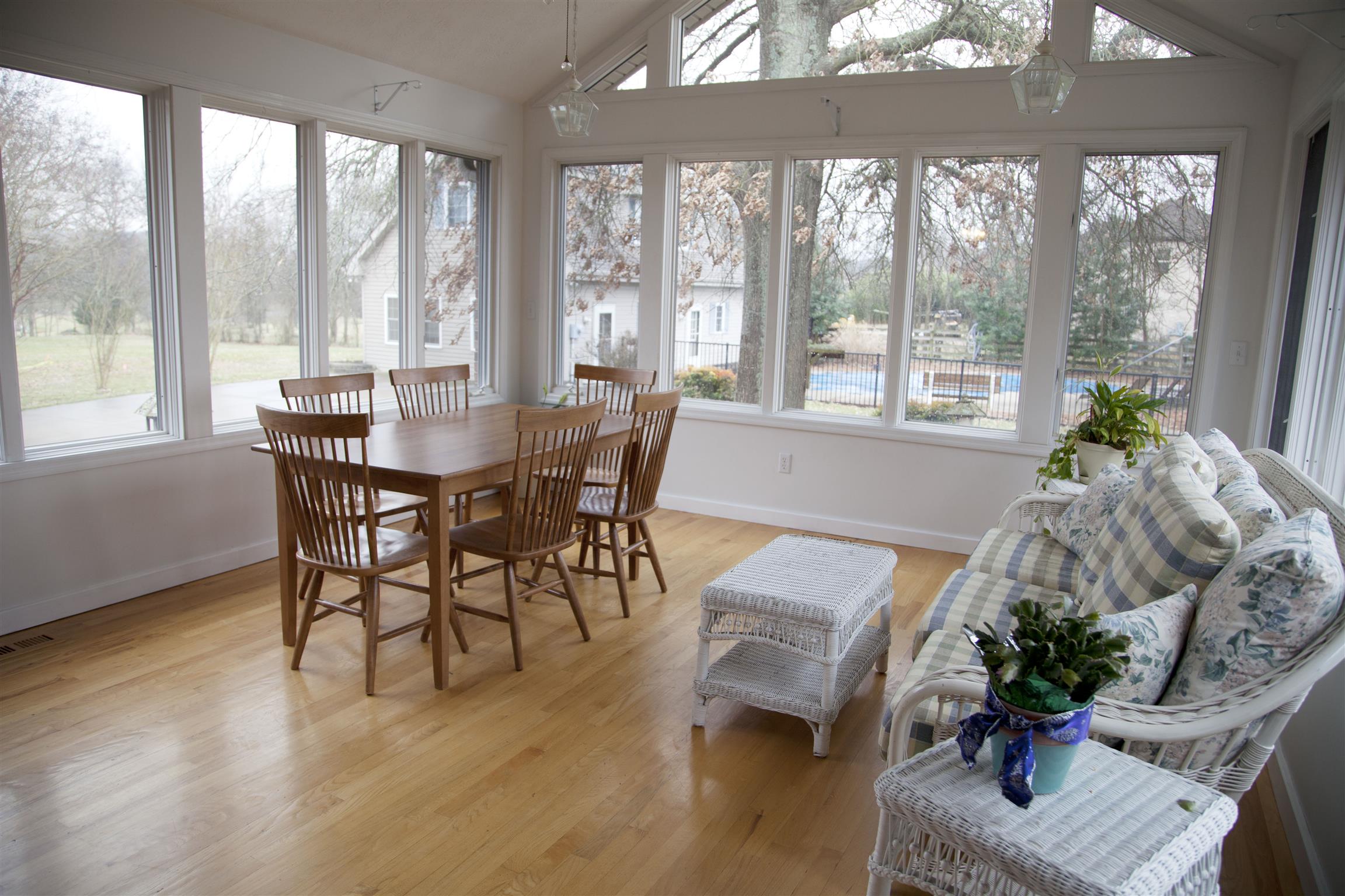 1861 Palmer Road Lebanon, TN 37090 - Photo 11 of 30 a dining room with furniture potted plants and wooden floor