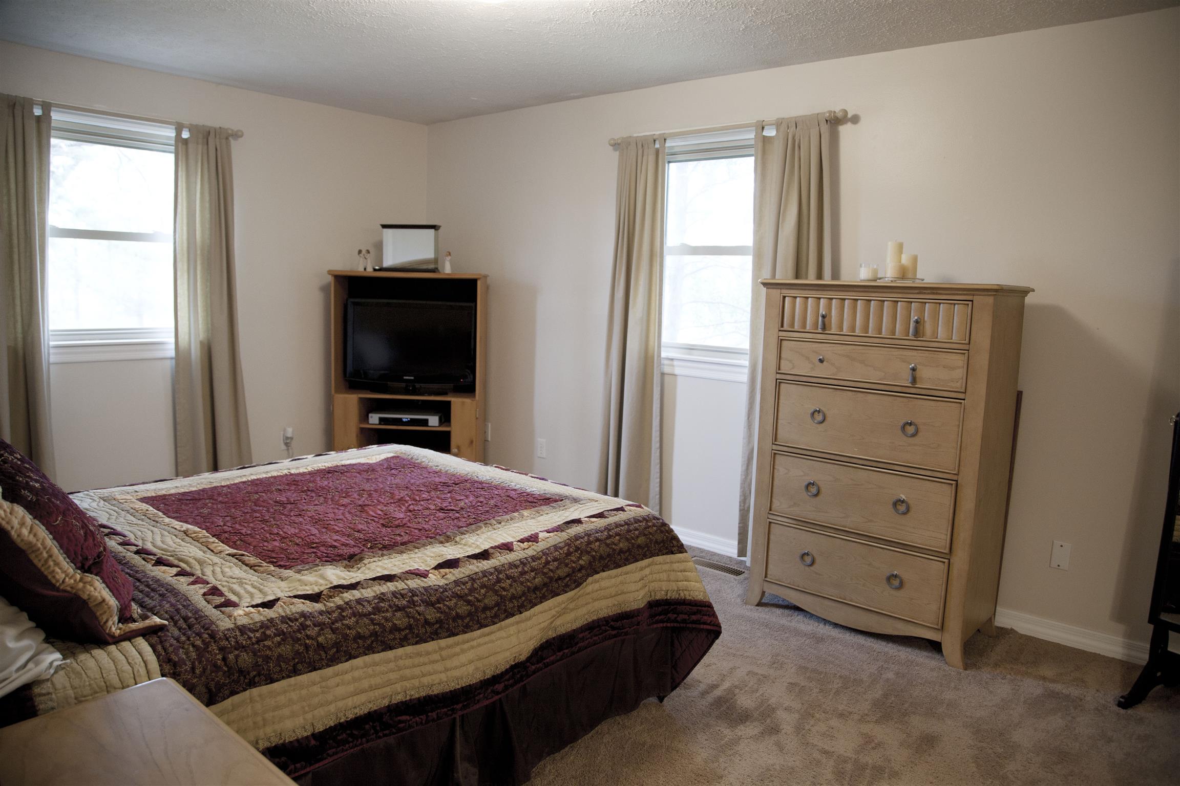 1861 Palmer Road Lebanon, TN 37090 - Photo 17 of 30 a living room with a bed and furniture