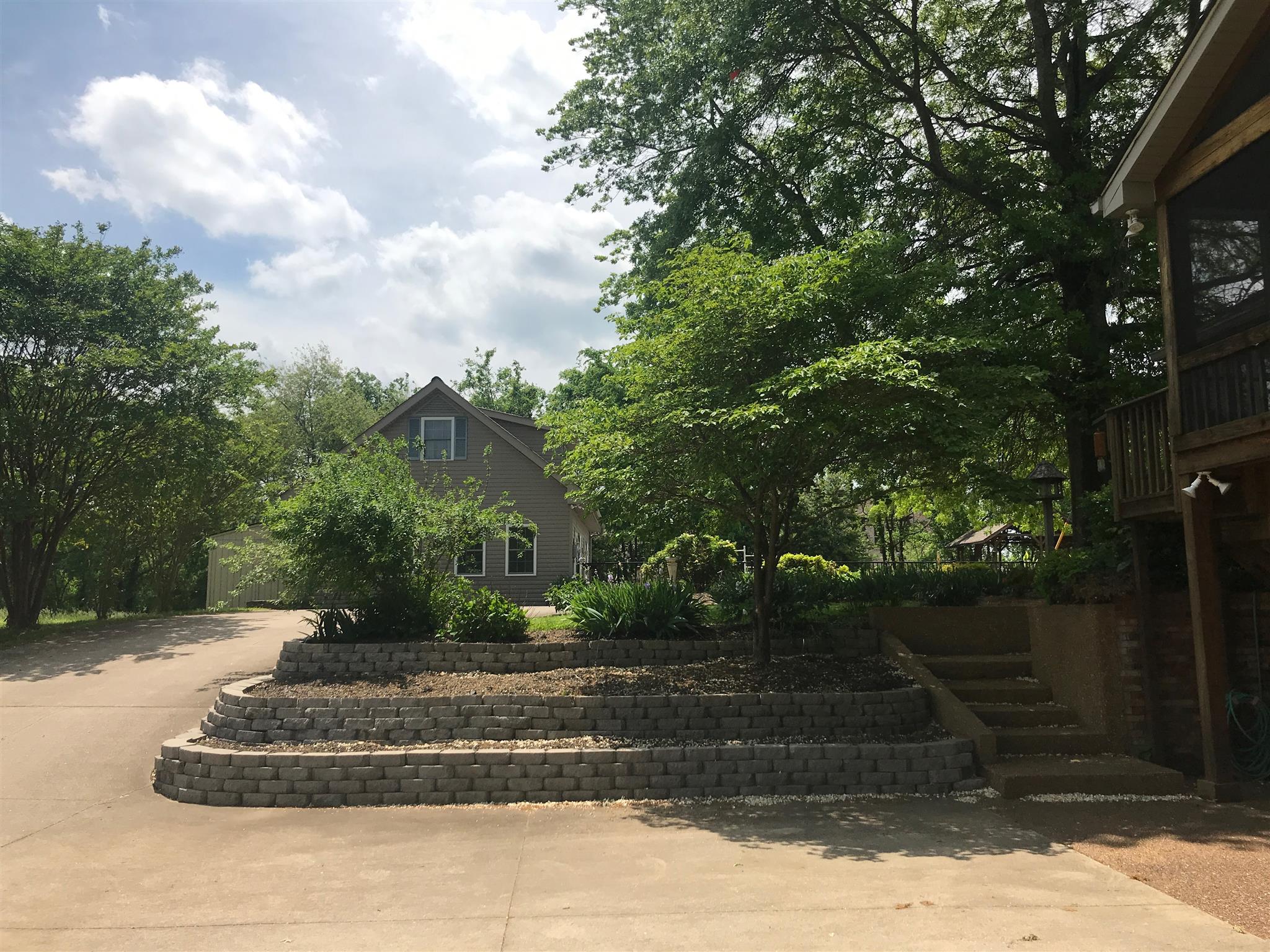 1861 Palmer Road Lebanon, TN 37090 - Photo 29 of 30 a front view of a house with a yard