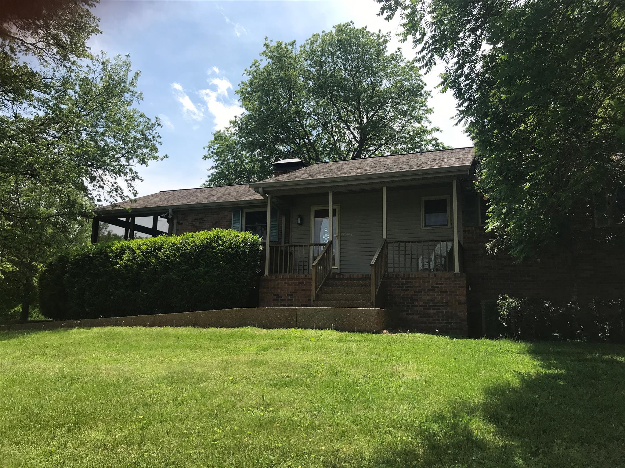 1861 Palmer Road Lebanon, TN 37090 - Photo 3 of 30 a view of a back yard of the house
