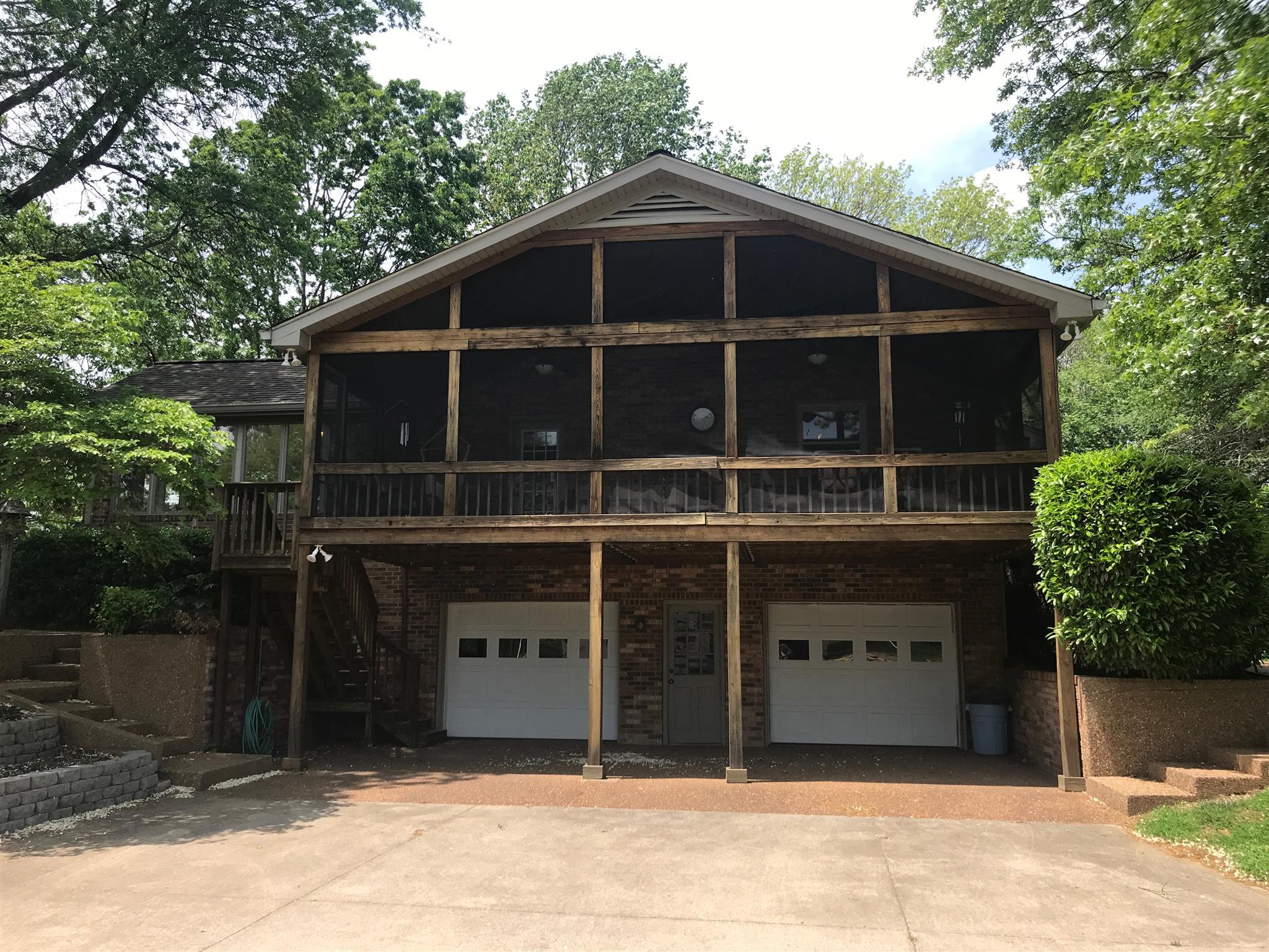 1861 Palmer Road Lebanon, TN 37090 - Photo 5 of 30 a front view of a house with a yard