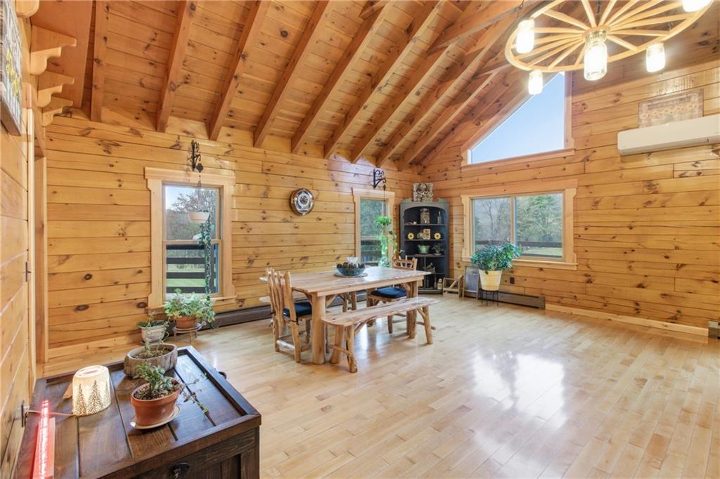 1089 Fire Tower Road Reynoldsville, PA 15851 - Photo 13 of 36 a living room with patio furniture and a wooden floor