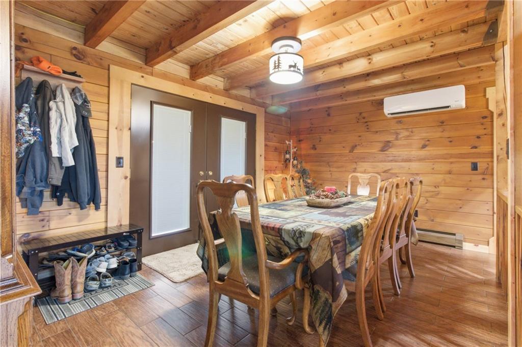 1089 Fire Tower Road Reynoldsville, PA 15851 - Photo 15 of 36 a view of a dining room with furniture window and wooden floor