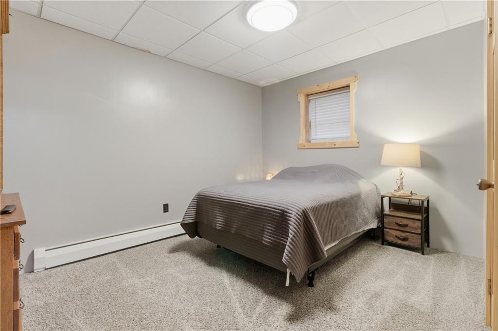 1089 Fire Tower Road Reynoldsville, PA 15851 - Photo 19 of 36 a bedroom with a bed and a night stand