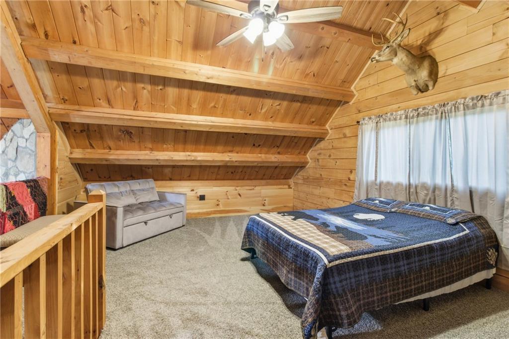 1089 Fire Tower Road Reynoldsville, PA 15851 - Photo 25 of 36 a bed sitting in a room next to a window