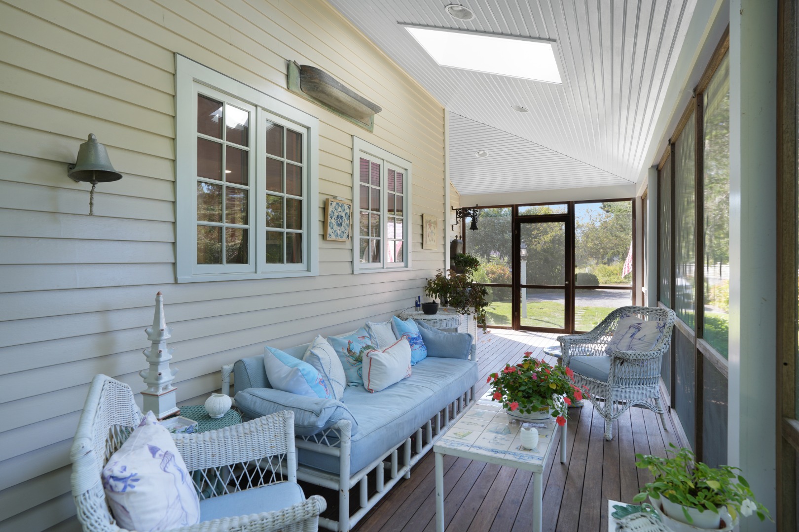19 Kitts Field Circle Edgartown, MA 02539 - Photo 11 of 69 a view of a deck with couches and potted plants
