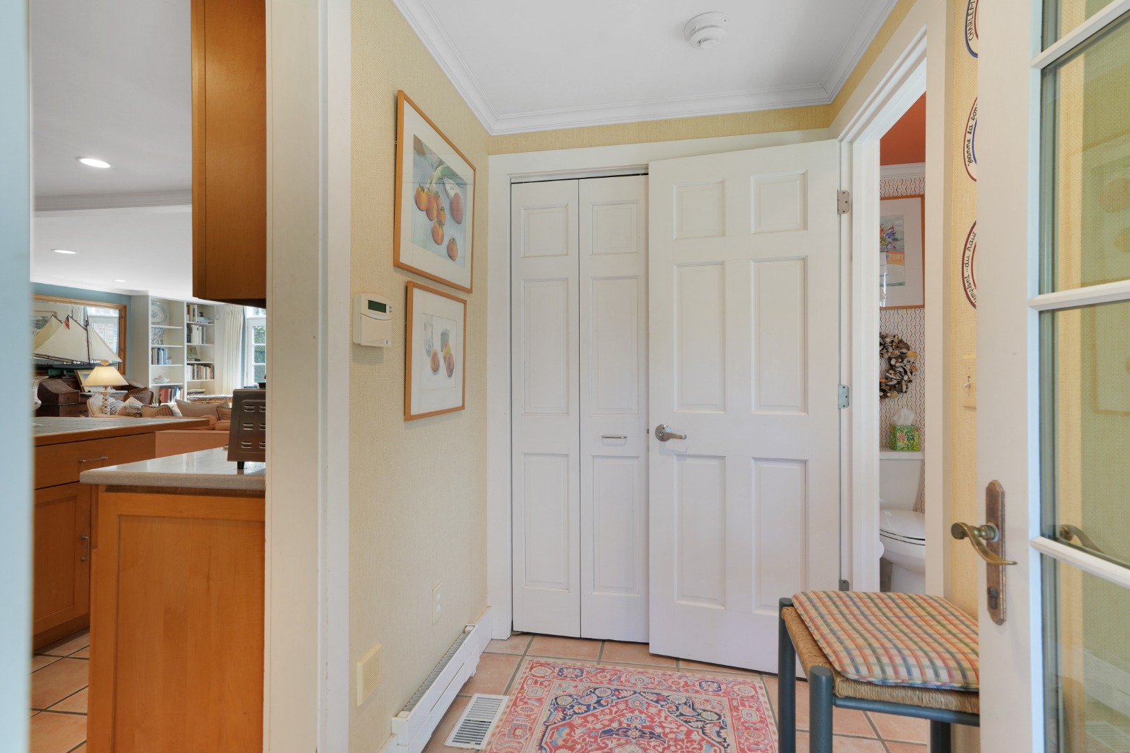 19 Kitts Field Circle Edgartown, MA 02539 - Photo 12 of 69 a view of a hallway with bathroom and wooden floor
