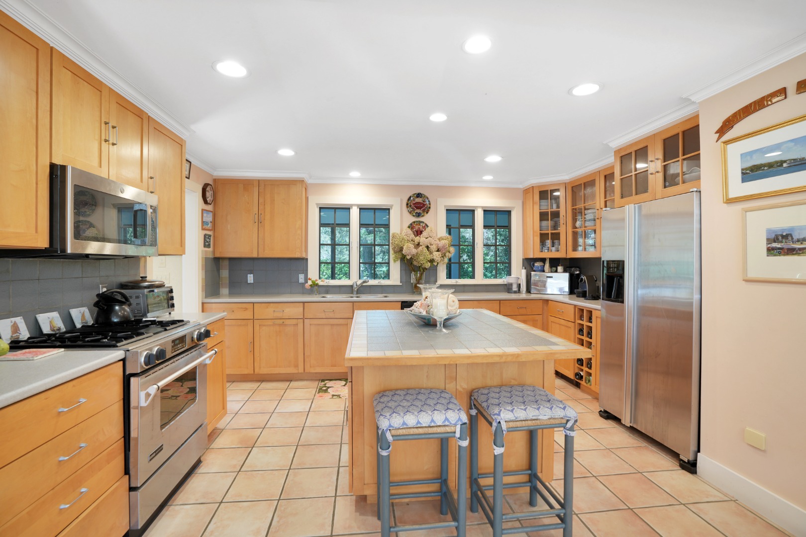 19 Kitts Field Circle Edgartown, MA 02539 - Photo 14 of 69 a large kitchen with kitchen island granite countertop a stove a sink a refrigerator and cabinets